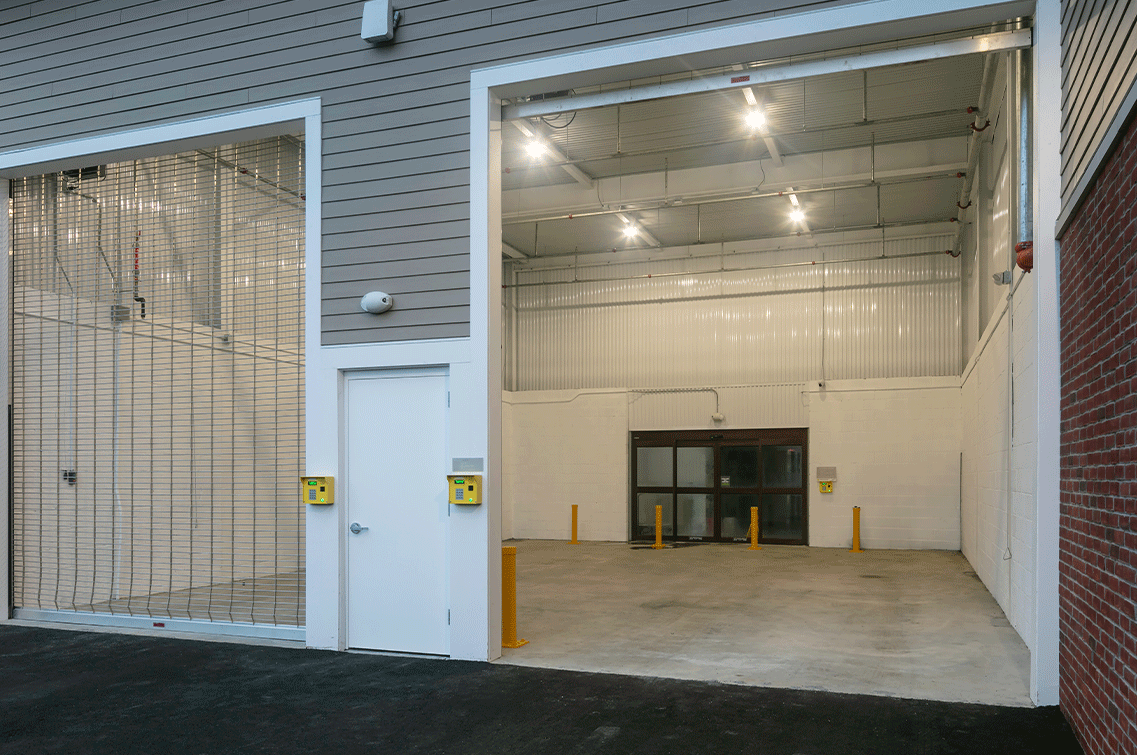 Image{width=1137,height=755,url='https://8488932.fs1.hubspotusercontent-na1.net/hubfs/8488932/BristolGallery-4.png',altText='A photo of the large, secure bay entry doors of DXD Capital's Bristol self storage facility. ',fileId=null}