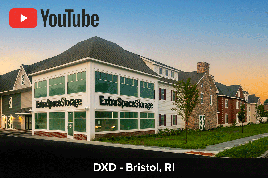 Image{width=1137,height=755,url='https://8488932.fs1.hubspotusercontent-na1.net/hubfs/8488932/BristolGallery-5-YouTube-Thumbnail.png',altText='A twilight shot of DXD Capital's self storage facility in Bristol, RI. This graphic links to the grand opening video on YouTube.',fileId=null}
