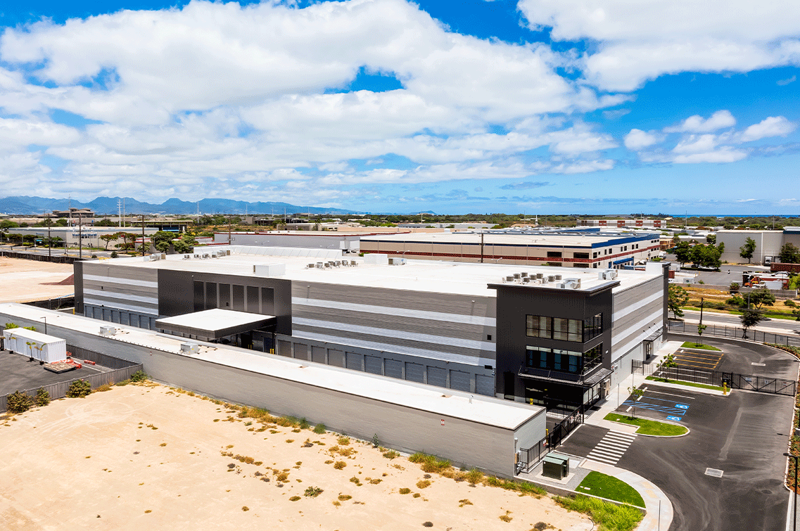 Image{width=1137,height=755,url='https://8488932.fs1.hubspotusercontent-na1.net/hubfs/8488932/KapoleiGallery-3.png',altText='An aerial shot of the Kapolei facility from the back lot. ',fileId=null}