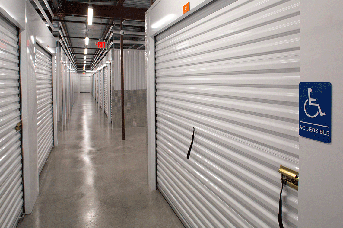 Image{width=1137,height=755,url='https://8488932.fs1.hubspotusercontent-na1.net/hubfs/8488932/SaharaGallery-4.png',altText='An interior shot of DXD Capital's self storage facility in Las Vegas showing a secure roll-down door of an ADA compliant unit.',fileId=null}