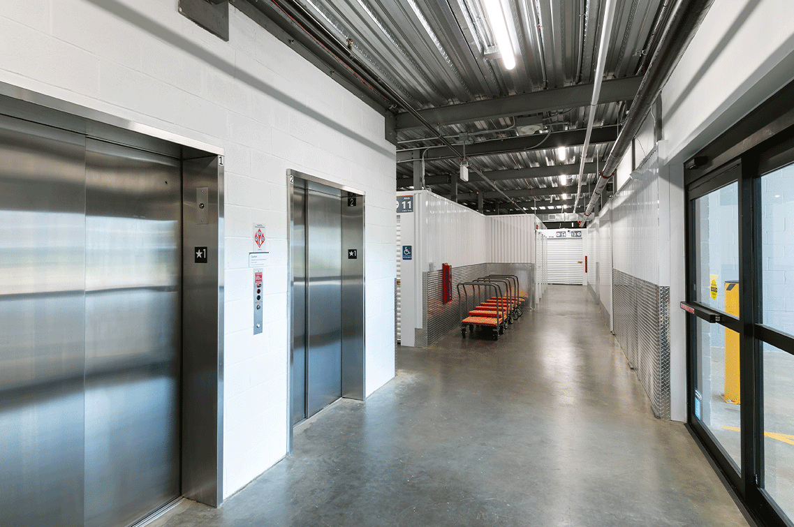 Image{width=1137,height=755,url='https://8488932.fs1.hubspotusercontent-na1.net/hubfs/8488932/Toms-RiverGallery-4.png',altText='An interior shot of DXD Capital's self storage facility in Toms River showing large freight elevators, automatic doors and carts.',fileId=null}